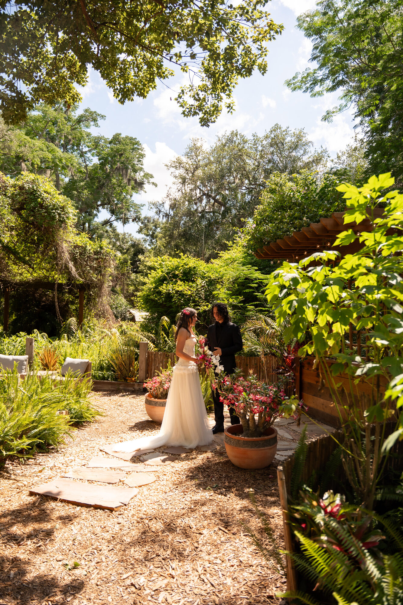 Bride and groom exchanging vows overlooking the ocean