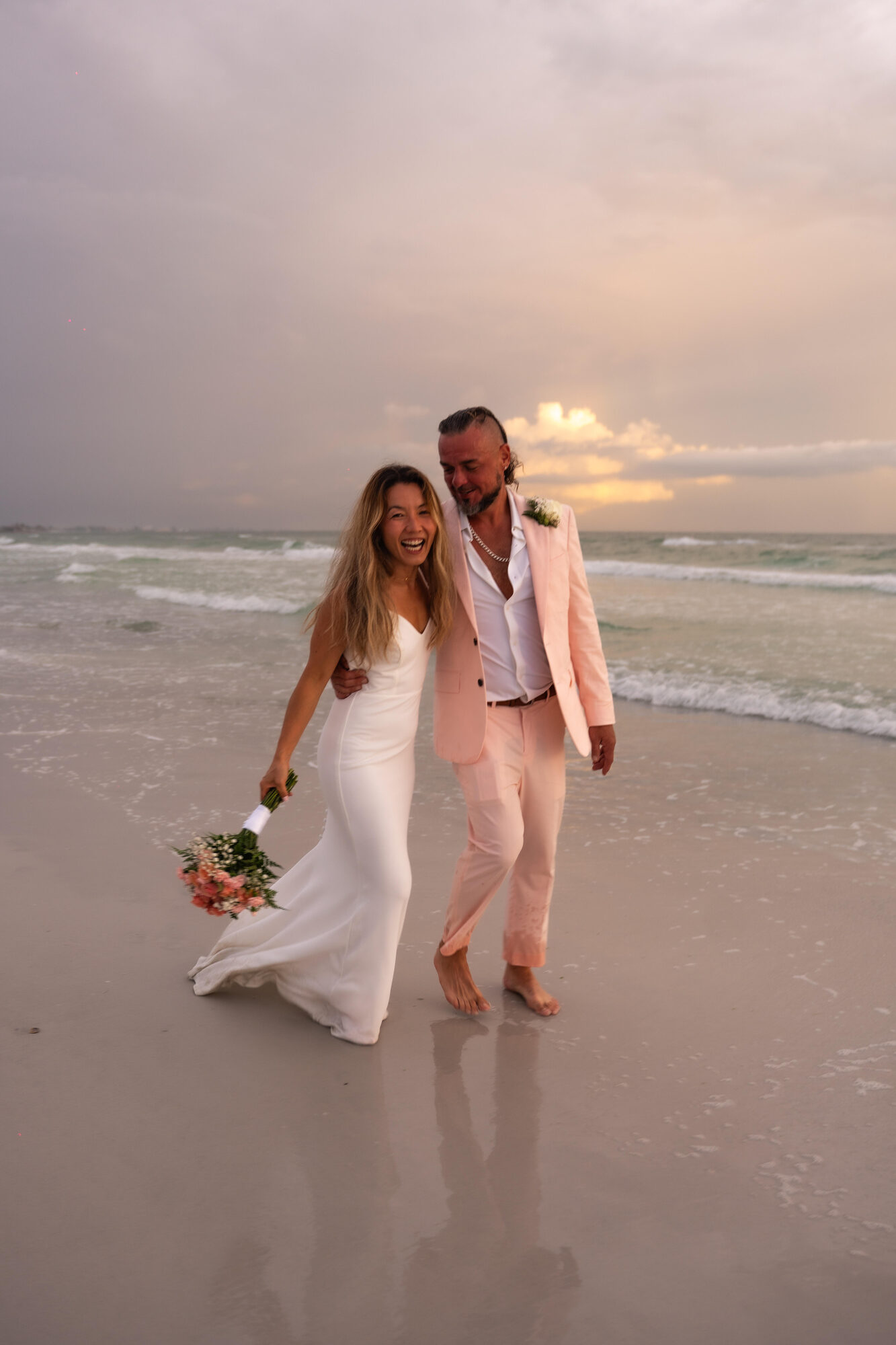 Groom and bride sharing a first look at a tropical destination venue
