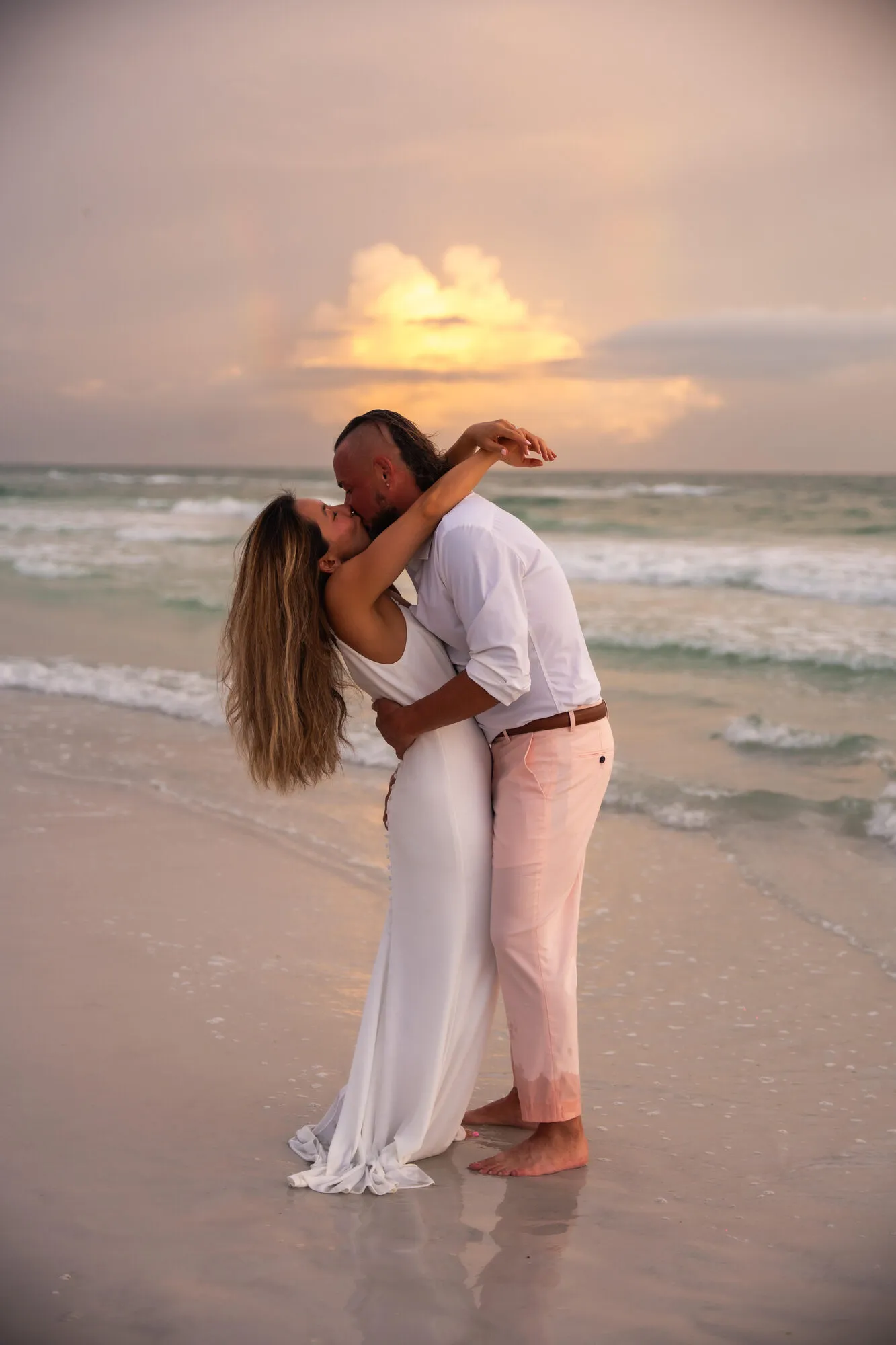 Newlyweds' first kiss at the end of the ceremony