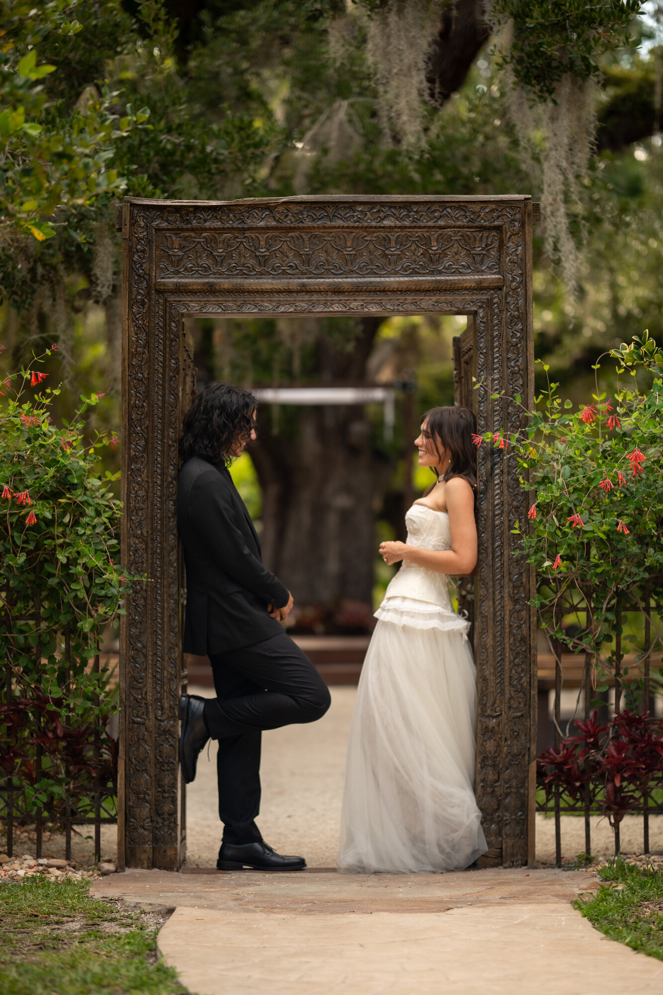 Bride and groom exchanging vows overlooking the ocean