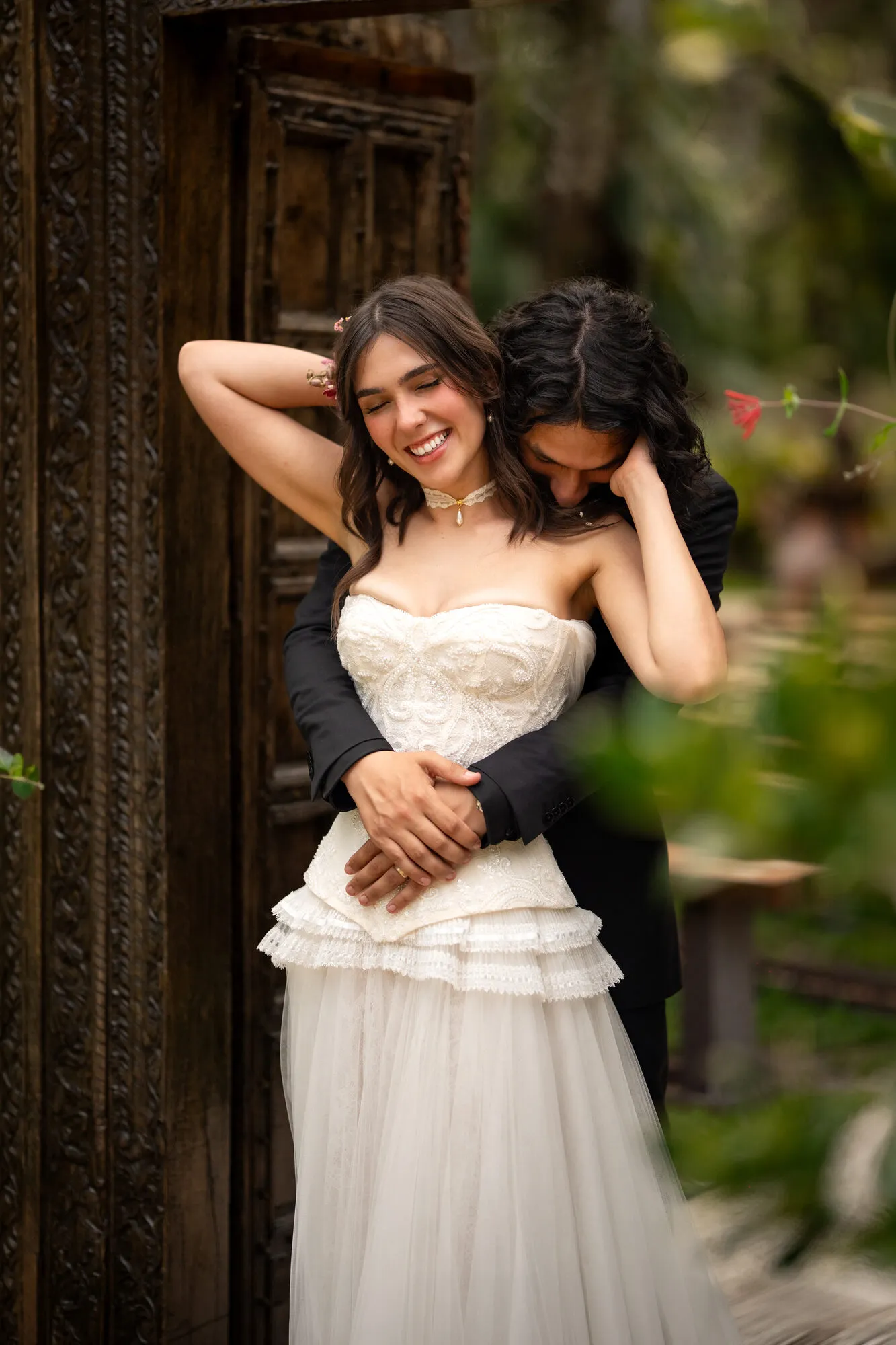 Groom and bride sharing a first look at a tropical destination venue