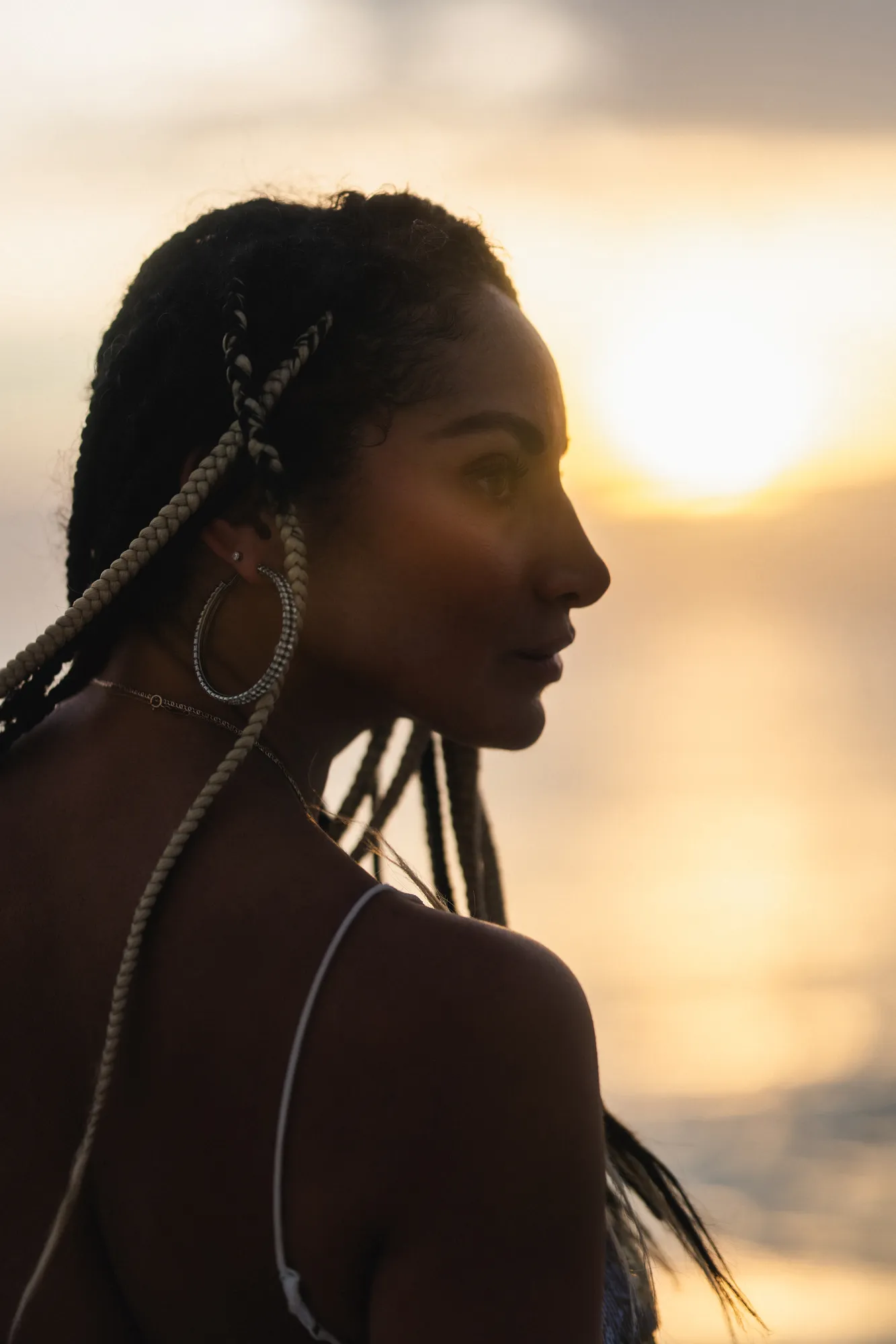 Sunset beach portrait walking along the Gulf shoreline in a white dress